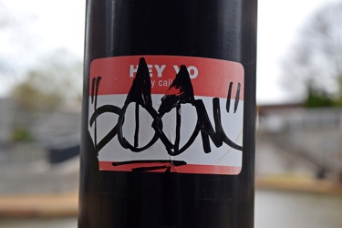 "BOOM" on a nametag sticker