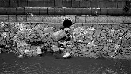 Mud around the side of the canal