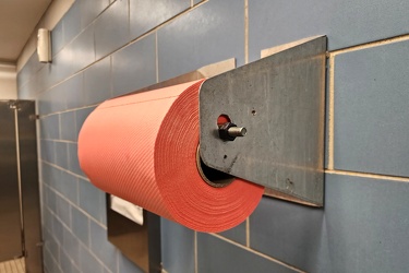 Shop towels in a dispenser