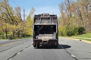 Garbage truck on Muncaster Mill Road