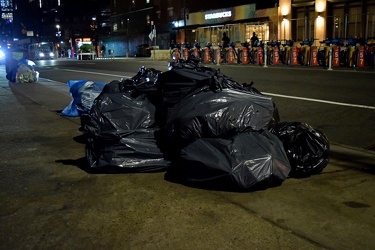 Trash bags along Hudson Street