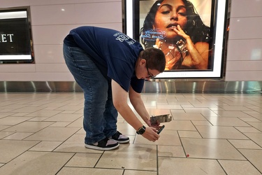 Elyse photographs a piece of candy