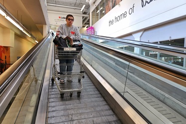 Elyse goes down the escalator at Loblaws [02]