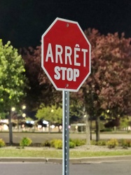 Bilingual stop sign at Walmart