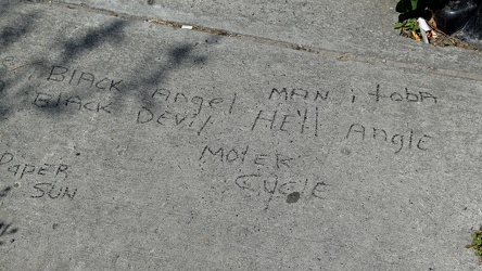 Sidewalk graffiti along Rideau Street