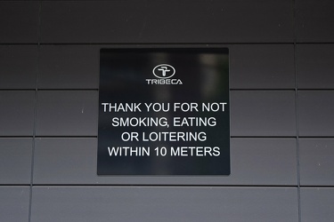 "Thank you for not smoking, eating, or loitering within 10 meters"