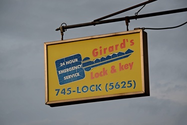 Sign for Girard's Lock & Key