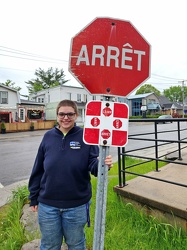 Elyse poses with a four-way stop [01]