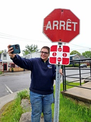 Elyse poses with a four-way stop [02]