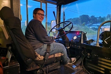 Elyse in the driver's seat of former CARTA bus 3424