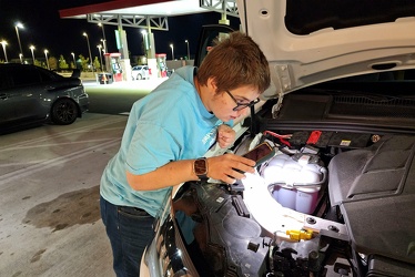 Elyse looks under the hood of an Audi Q7 [02]