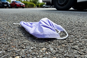 Discarded face mask at Montgomery Village Crossing