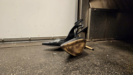 Abandoned pair of shoes on the Metro