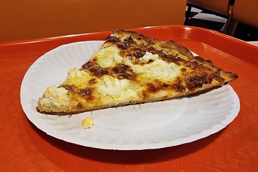 Slice of white pizza from Geraci's Slice Shop