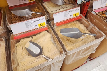 Bins of parmesan cheese at Bulk Barn