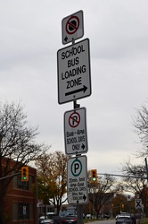 Parking regulation signs on Victoria Avenue [01]