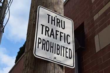 "THRU TRAFFIC PROHIBITED" sign at an alley entrance [02]