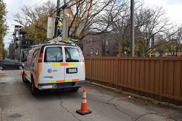 Utility worker in an alley