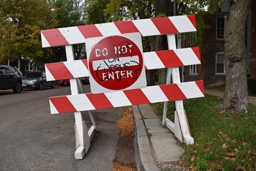 "DO NOT ENTER" sign with religious graffiti