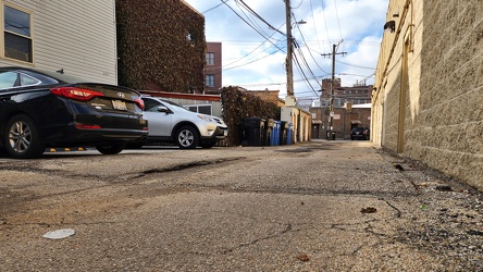 Speed hump in an alley west of North Oakley Avenue