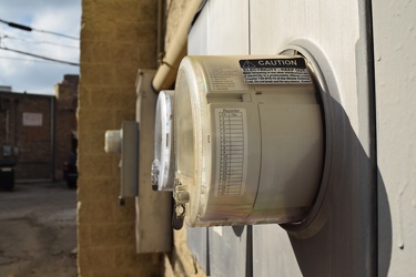 Electric meters on the back side of a shopping center [02]