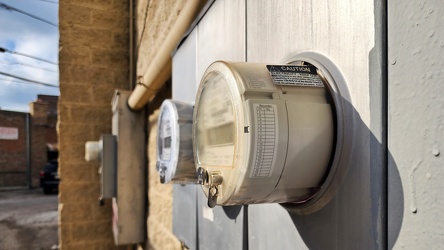 Electric meters on the back side of a shopping center [01]