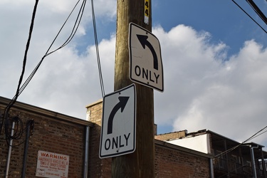 Turn signage at the intersection of two alleys [01]