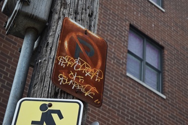 Rusted no parking sign in an alley [01]