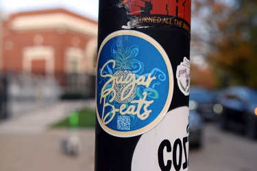 "Sugar Beats" sticker on a lamppost