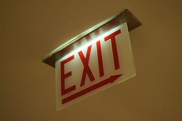 Exit sign in the lower lobby at 875 North Michigan Avenue