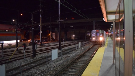 Red Line train arriving at East 55th Street station