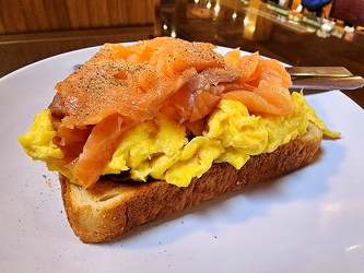 Salmon and eggs on avocado toast