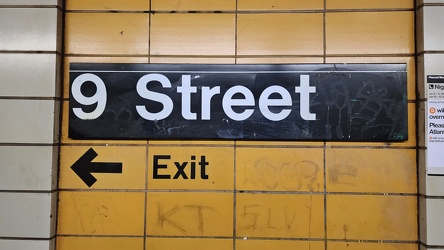 Wall sign at 9th Street station