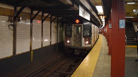 Train arriving at 5th Avenue-Bryant Park station