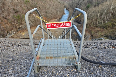 "NO TRESPASSING" sign on stairs [01]