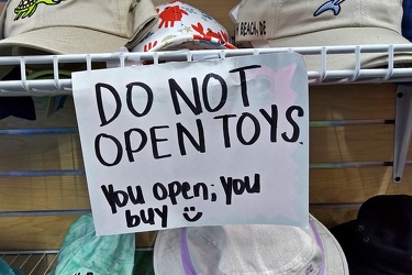 "Do not open toys" sign at Tidal Rave's 5 & 10