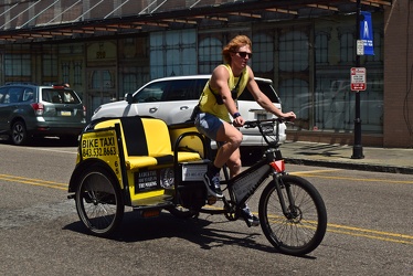 Pedicab operator in downtown Charleston