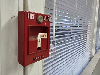 Fire alarm pull station with broken handle