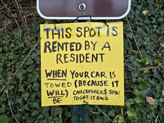 Reserved parking spot with handmade sign [02]