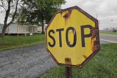 Rusted yellow stop sign