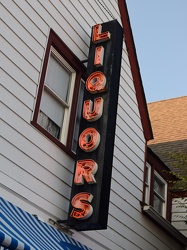 Sign for White's Liquor